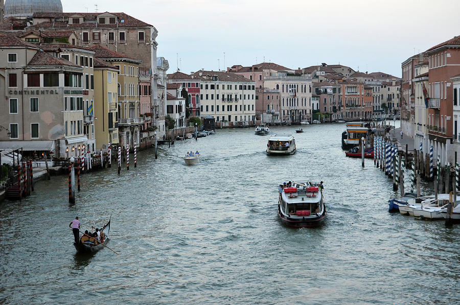 Gondolas and Vaporettos in the Early Evening on the Grand Canal Venice Italy Photograph by Shawn OBrien