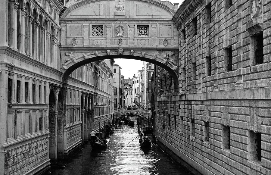 Gondolas Beneath Bridge of Sighs in Venice italy Black and White Photograph by Shawn OBrien