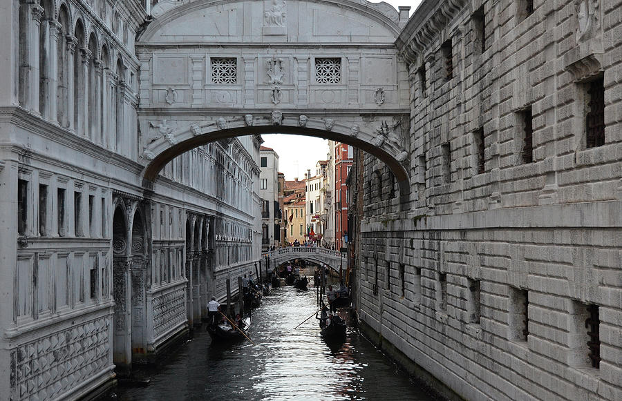 Gondolas Beneath Bridge of Sighs in Venice italy Photograph by Shawn OBrien