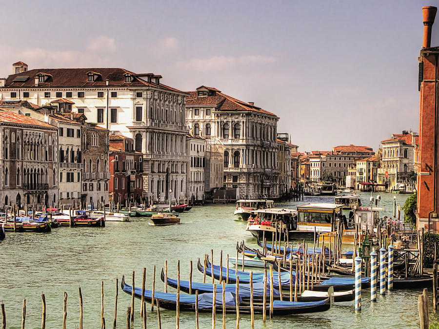 Gondolas by The Grand Canal Photograph by Nicola Nobile