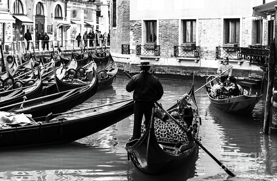 Gondolier in Venice 2009 Photograph by John Rizzuto