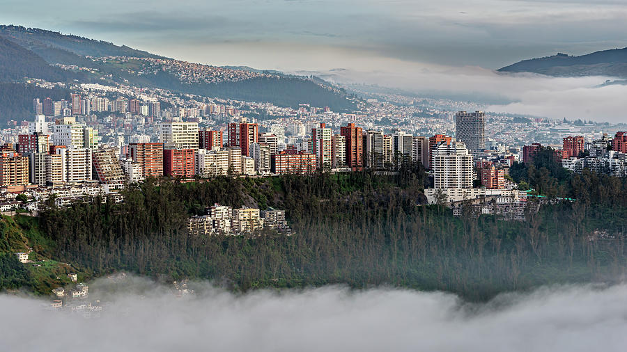 Gonzalez Suarez district skyscrapers above the Guapulo valley with mist Photograph by Henri Leduc