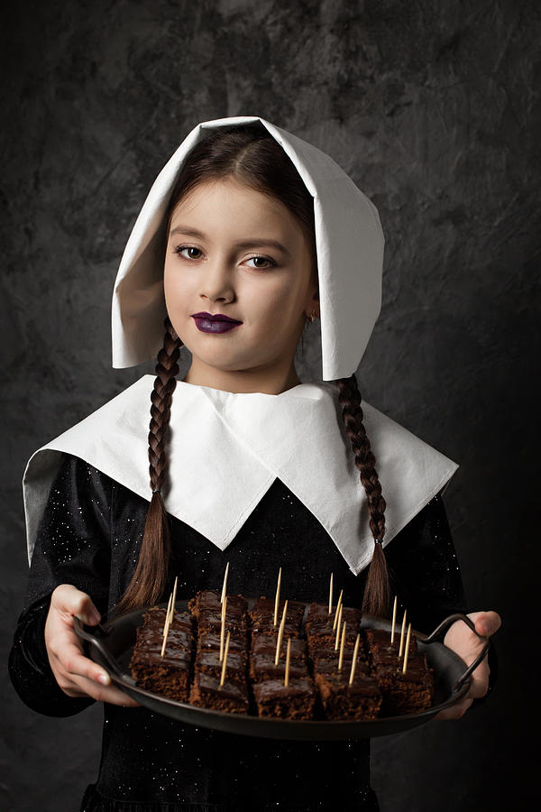 Gothic Girl With Pigtails In A Cap Holds A Tray With Chocolate Cake Photograph