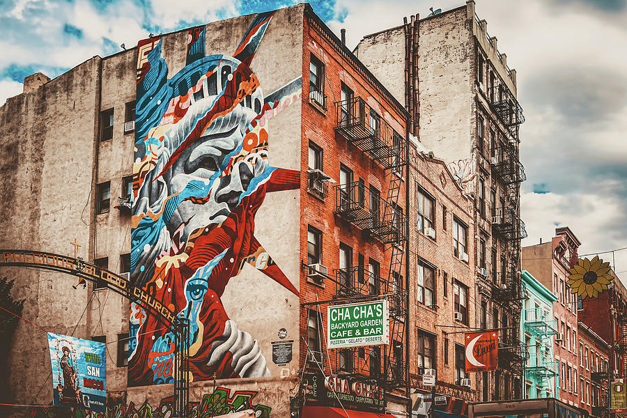 Graffiti of the Statue of Liberty in New Yorks Little Italy Photograph by Karel Miragaya