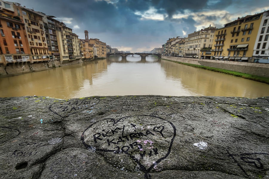 Graffiti over the Arno Photograph by Bill Chizek