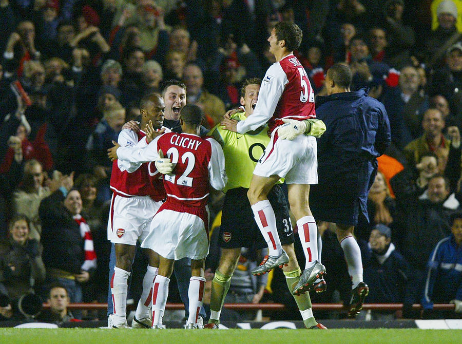 Graham Stack of Arsenal celebrates with his team-mates Photograph by Ben Radford