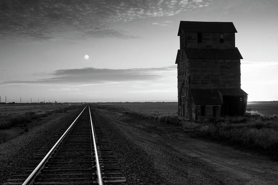 Grain Elevator, Railroad Tracks, Moonrise Photograph by Anthony John Coletti