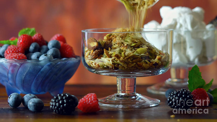 Grain free oat free paleo diet granola breakfast. Photograph by Milleflore Images
