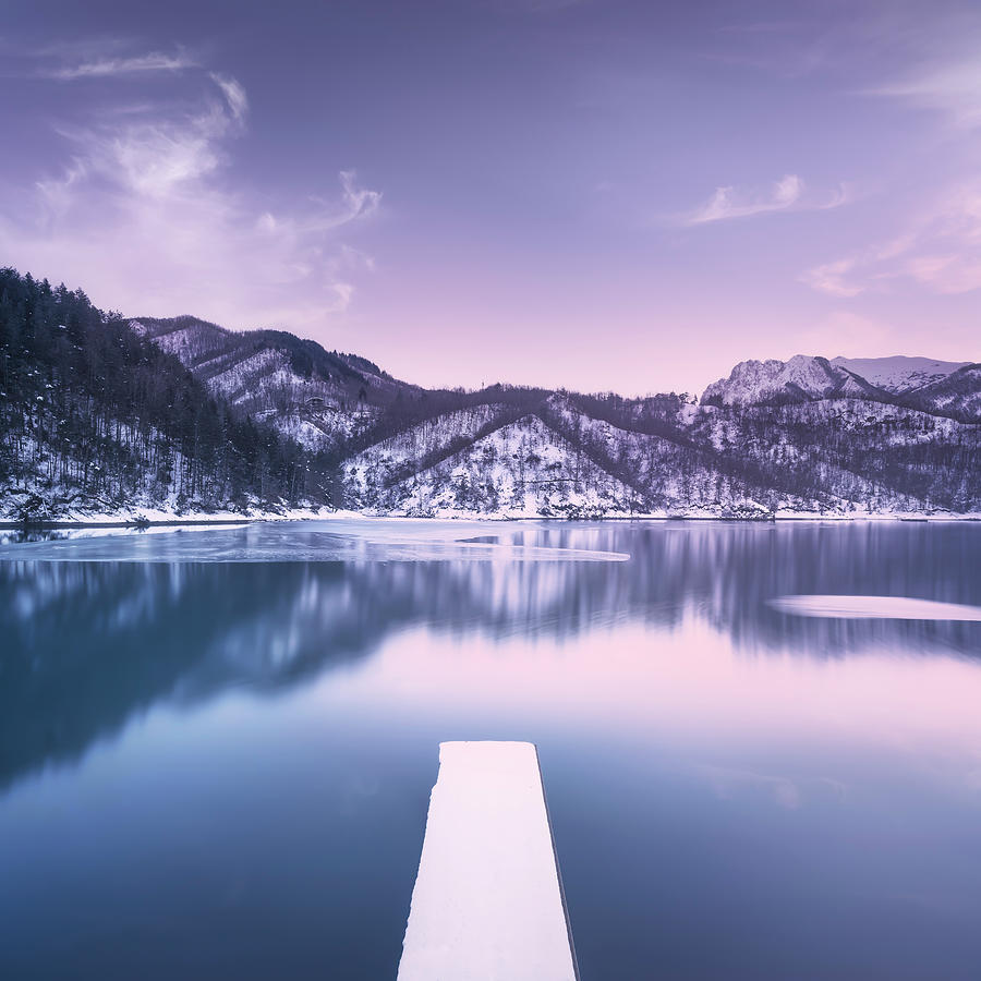 Gramolazzo iced lake and snowy pier in Apuan mountains. Photograph by Stefano Orazzini