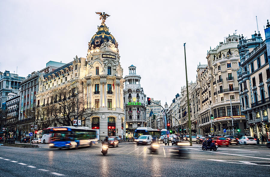 gran via in Madrid at sunset with clouds. Spain Photograph by Eloi_Omella