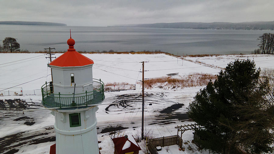 Grand Island Harbor Lighthouse in Munising Michigan during winter Photograph by Eldon McGraw