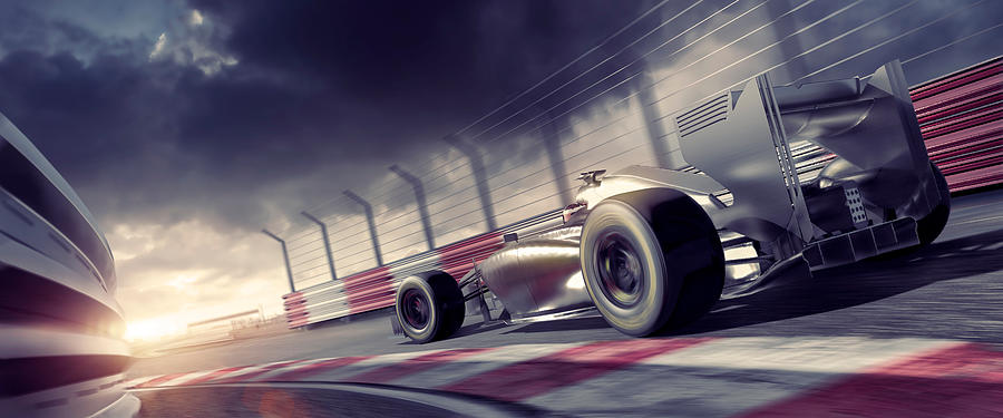 Grand Prix High Speed Racing Car On Racetrack At Sunset Photograph by Peepo