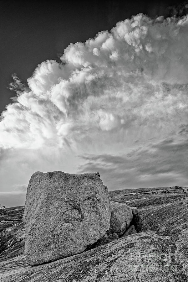 Granite Boulder Against a Storm Cell - Summit Trail Enchanted Rock State Natural Area - Texas Photograph by Silvio Ligutti