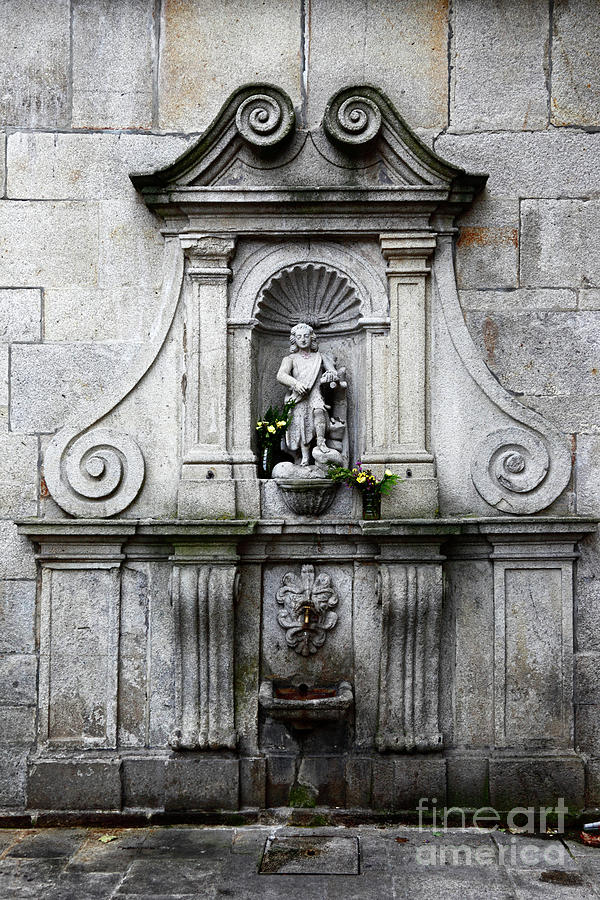 Granite stone fountain Viana do Castelo Portugal Photograph by James Brunker
