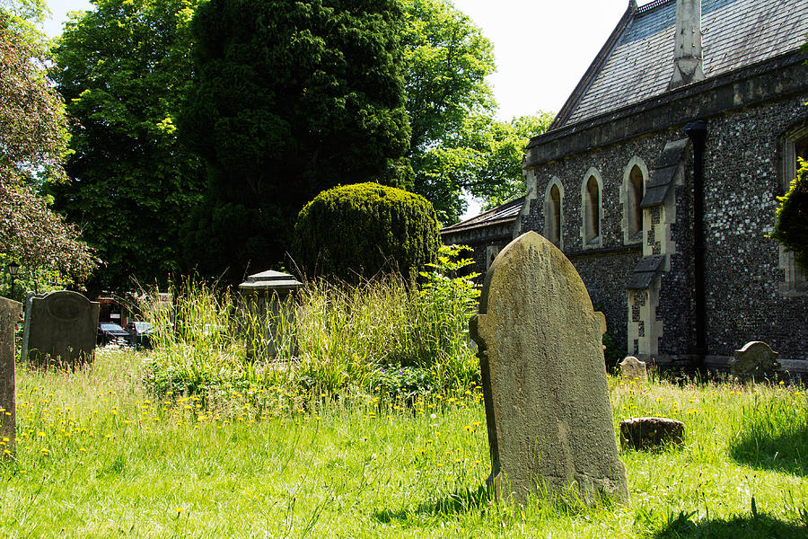 Grave stones outside a church in Beaconsfield, Buckinghamshire, Photograph by Christopherhall