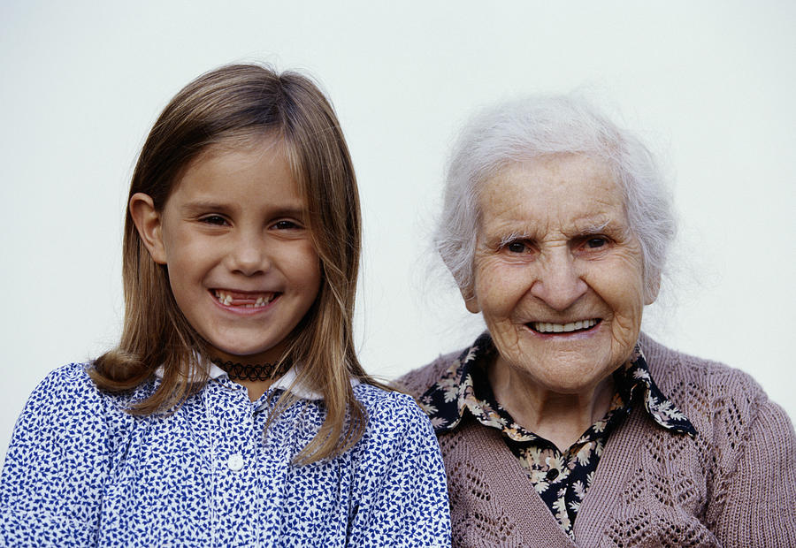 Great grandmother and great granddaughter (6-8), portrait Photograph by Jonathan Kirn