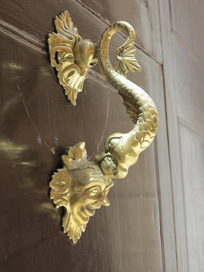 Great knocker on a door in Ciutadella Photograph by Petra Rau