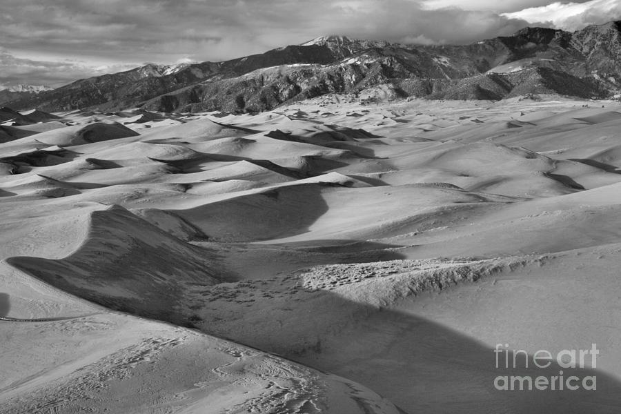 Great Sand Dune Curves Below Sangre De Cristo Mountains Black And White Photograph by Adam Jewell