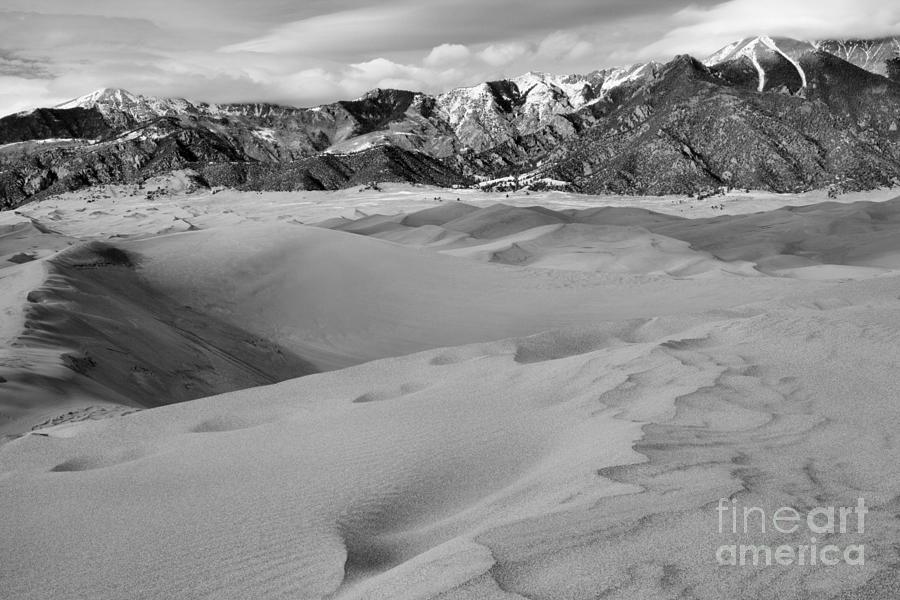 Great Sand Dunes Below The Snow Capped Peaks Black And White Photograph by Adam Jewell
