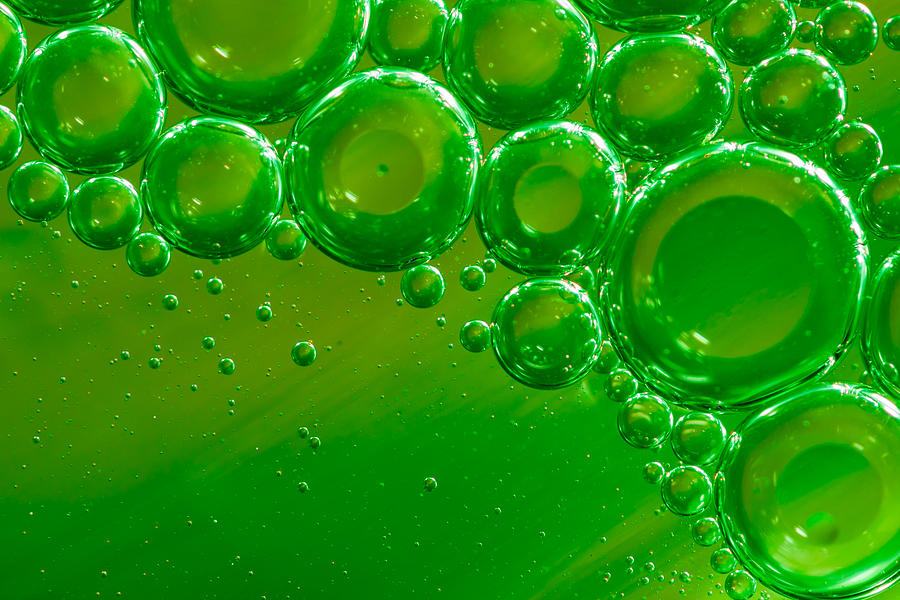 Green bubbles background Photograph by ConstantinCornel