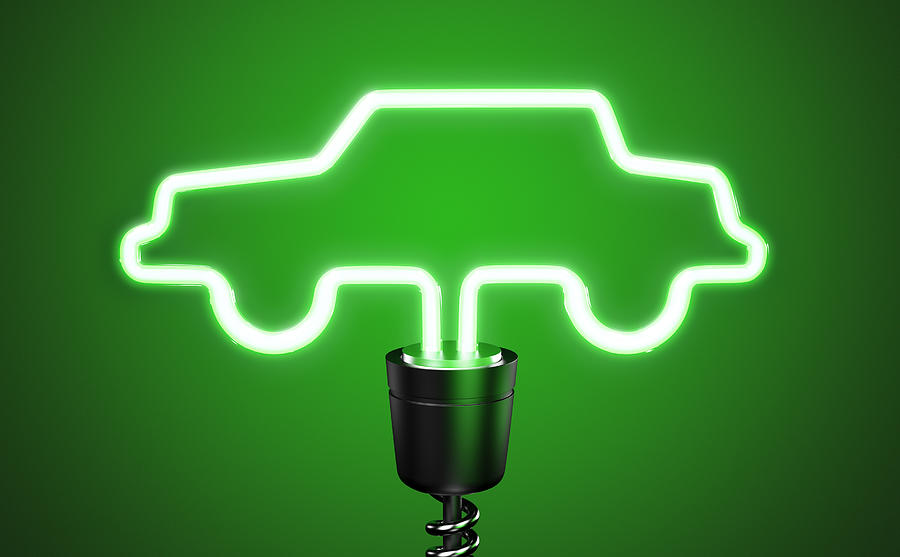 Green, car shaped energy saving eco lightbulb Photograph by I Like That One