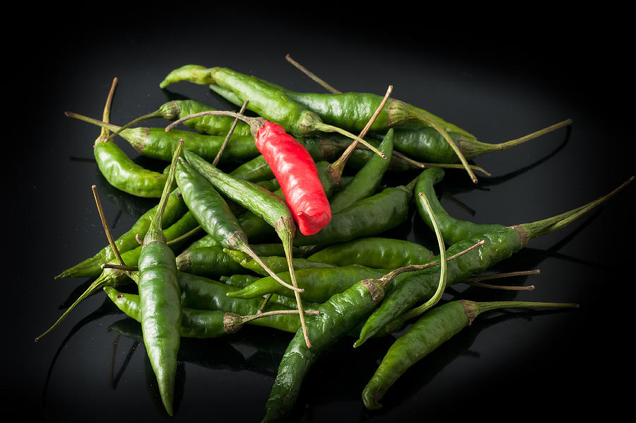 Green Chili Peppers And Red Photograph by Ermetico72