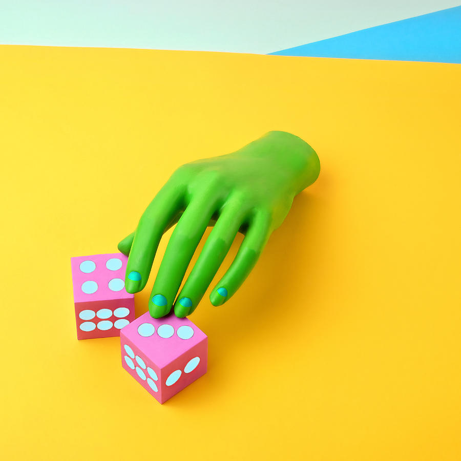 Green Mannequin Hand With Dice Photograph by Juj Winn