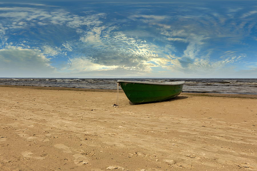 Green Pea Boat on the Jurmala Beach Photograph by Aleksandrs Drozdovs