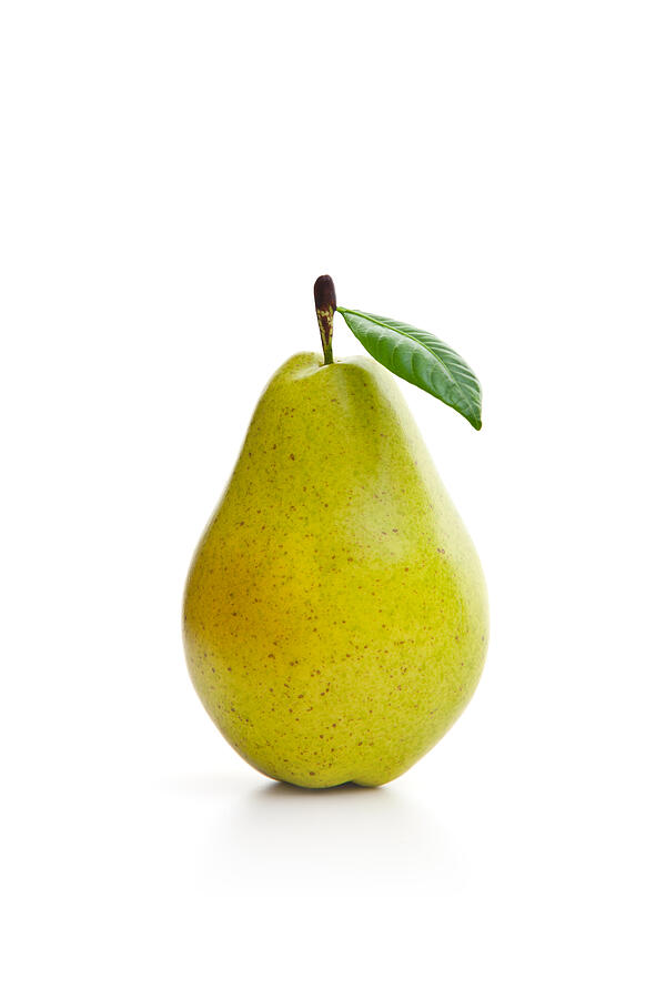 Green pear on the white background Photograph by Emrah Turudu
