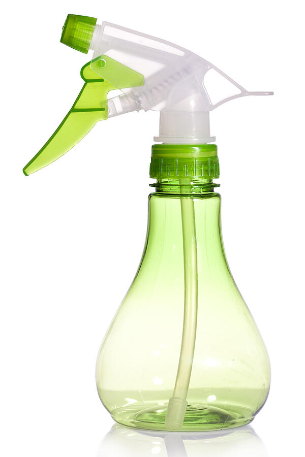 Green spray bottle Photograph by Anna Yu