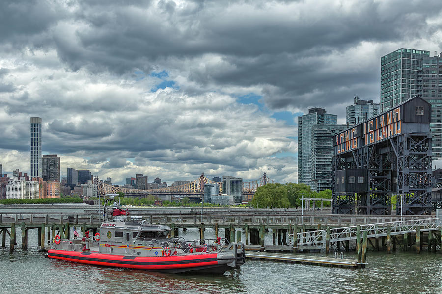 Grey Clouds and Fire Boat Photograph by Cate Franklyn