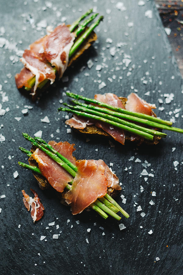 Grilled asparagus and ham tapas Photograph by Alexandra Iakovleva