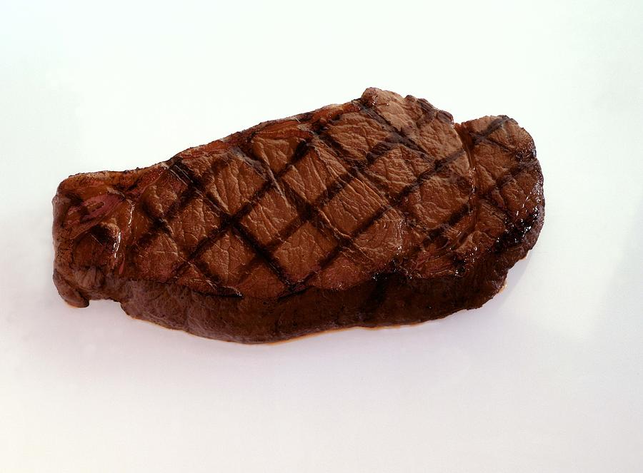 Grilled New York strip steak Photograph by Jupiterimages