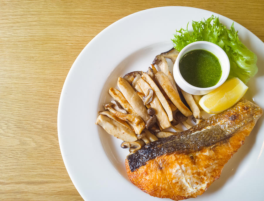 Grilled salmon steak and mushroom Photograph by Everythingpossible