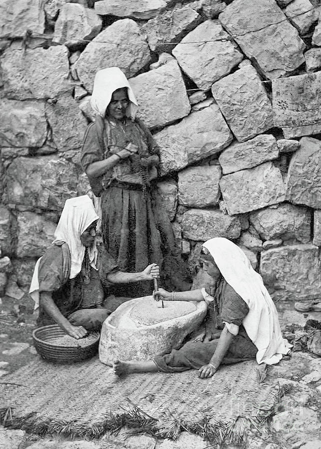 Grinding in Bethlehem in 1917 Photograph by Munir Alawi
