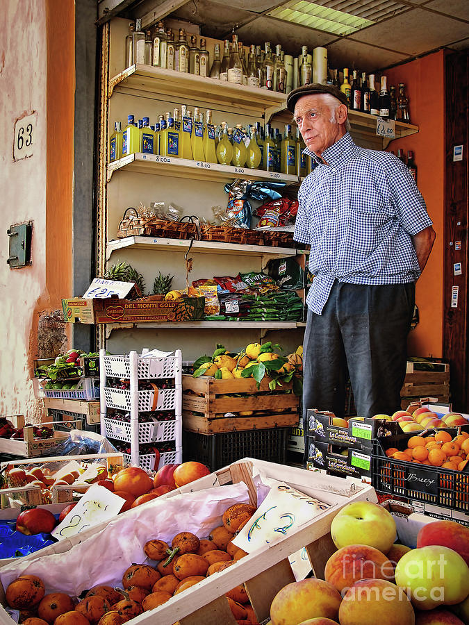 Grocer Man in Procida Photograph by Jennie Breeze