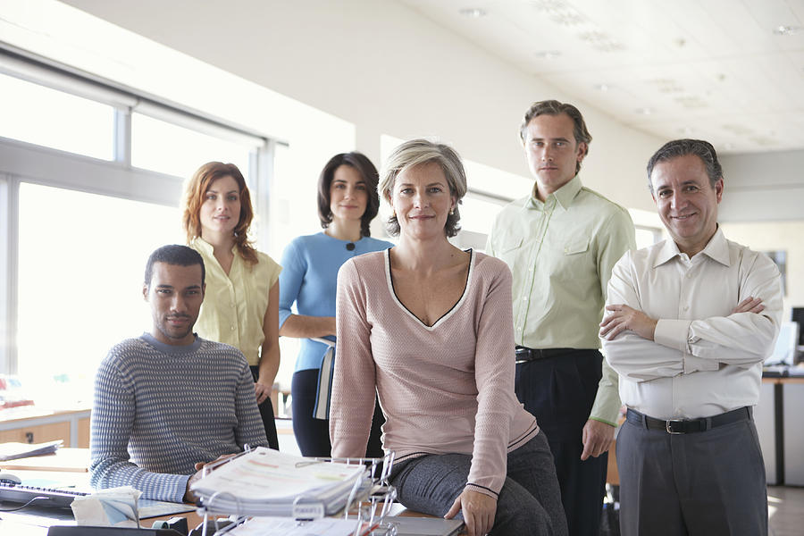 Group of business colleagues in office, portrait Photograph by Getty Images