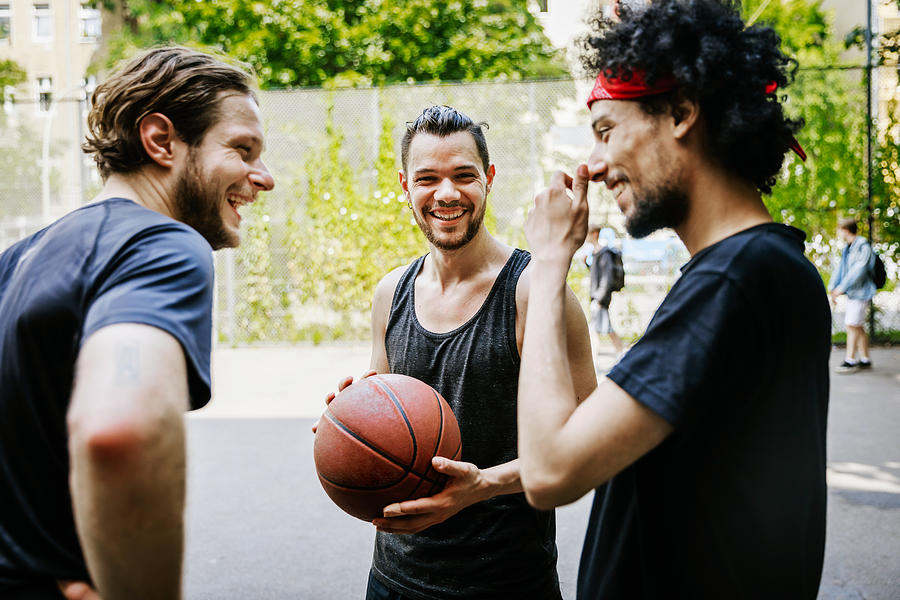 Group Of Friends Having Fun Together At An Outdoor Basketball Court Photograph by Hinterhaus Productions