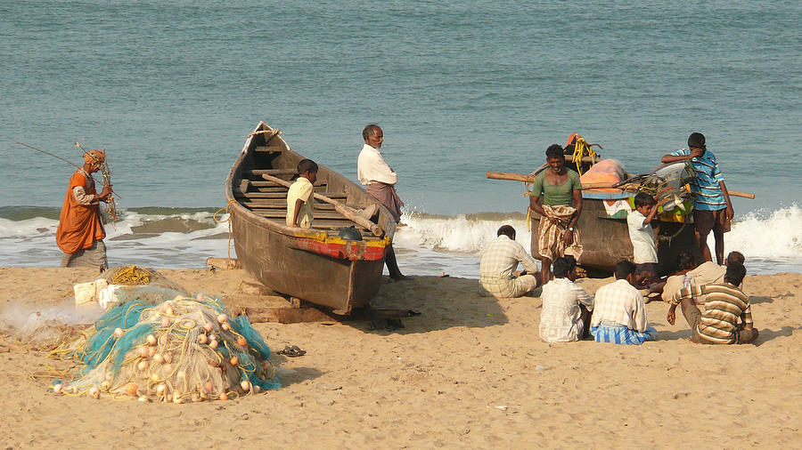 Group of local fishermen with their boats and nets on the beach in Gokarna, Karnataka, India Photograph by Photo by Victor Ovies Arenas