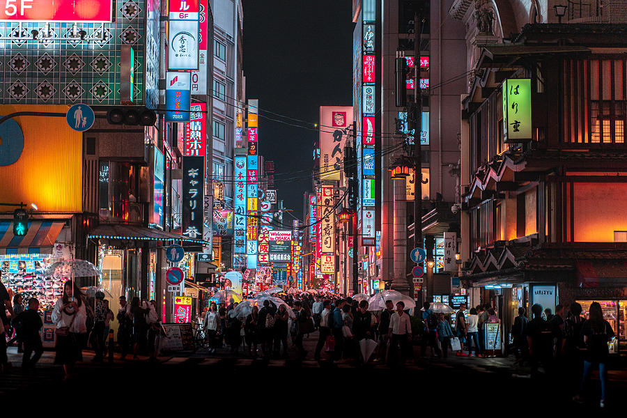 Group of pedestrians on the streets of Osaka Photograph by Ruben Earth