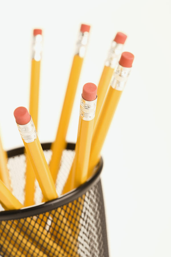 Group of pencils in a pencil holder with eraser ends up Photograph by Fotosearch