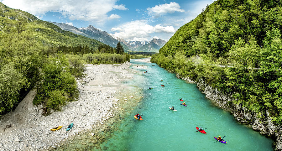 Group of people kayaking on the river Soča in Slovenia Europe Photograph by Ziga Plahutar