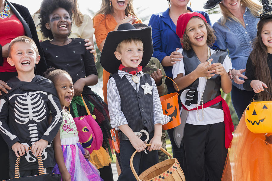 Group of women with children in halloween costumes Photograph by Kali9