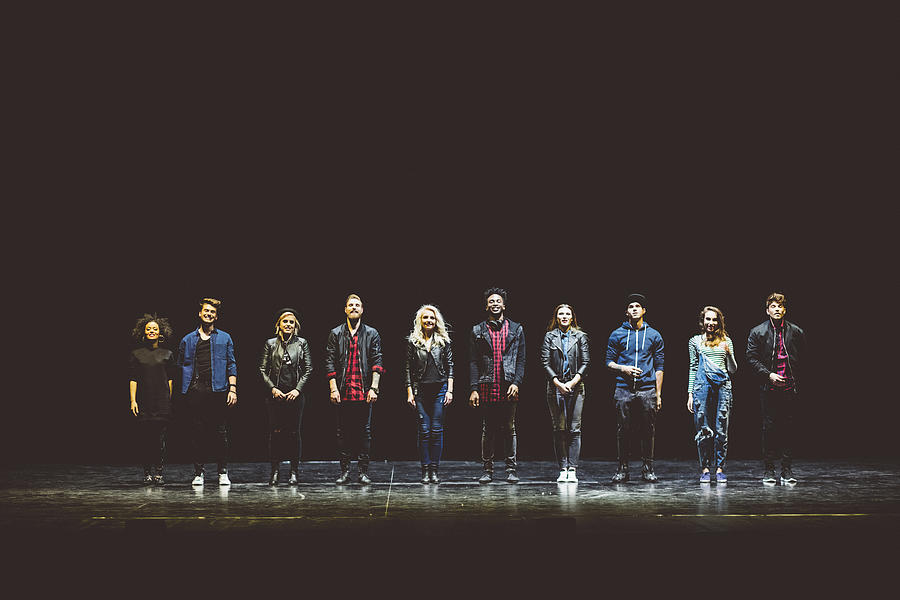 Group of young actors on the stage Photograph by Izusek
