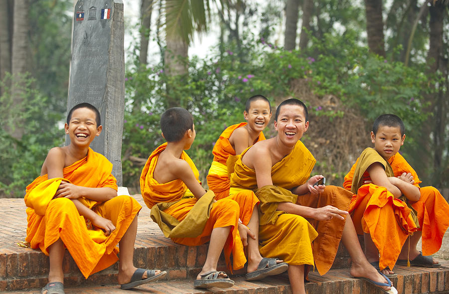 Group of young monks laughing, Laung Prabang, Laos Photograph by Tarzan9280