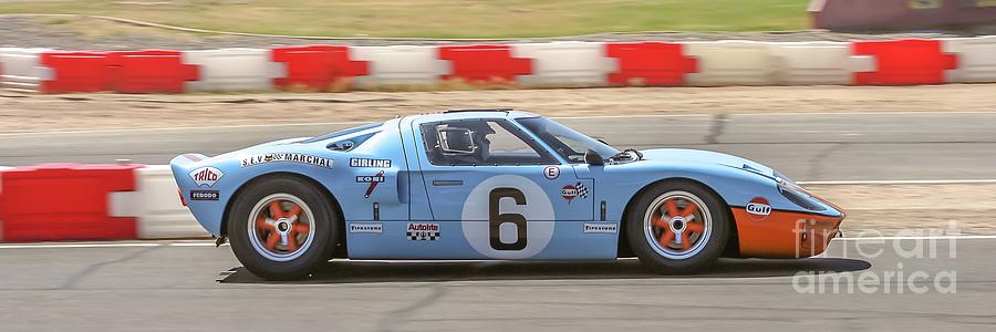 GT40 racing Photograph by Darrell Foster