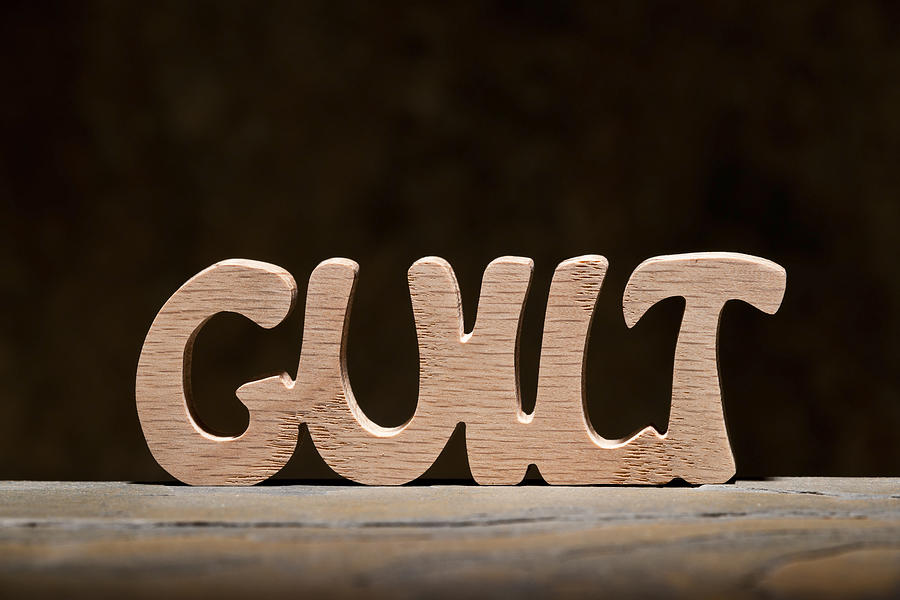 Guilt: Letters Handcut from Wood Photograph by Dlerick
