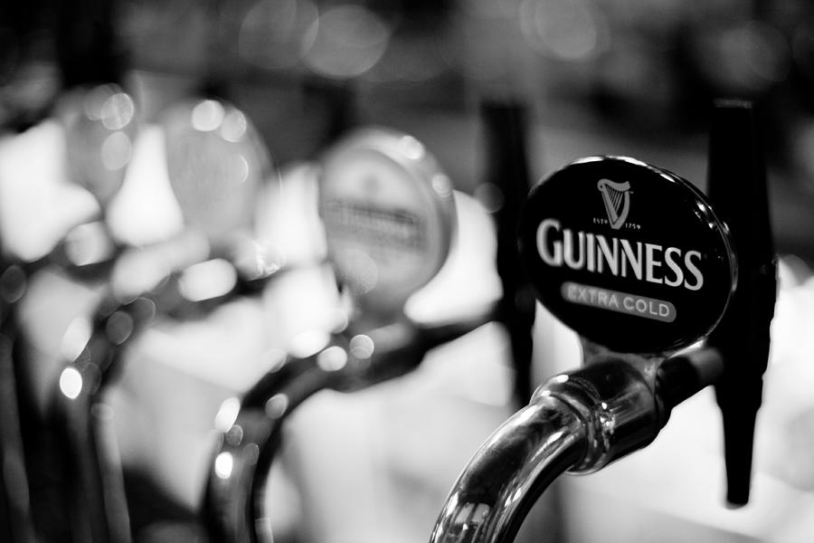 Guinness tap at an English Pub Photograph by Epicurean