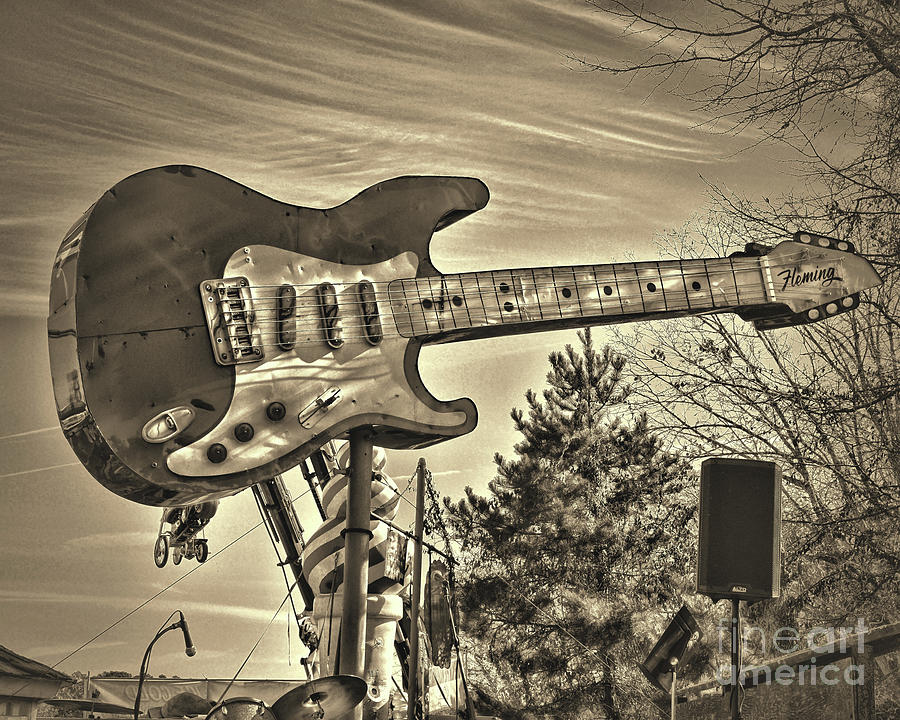 Guitar in the Sky sepia Photograph by Paul Ward