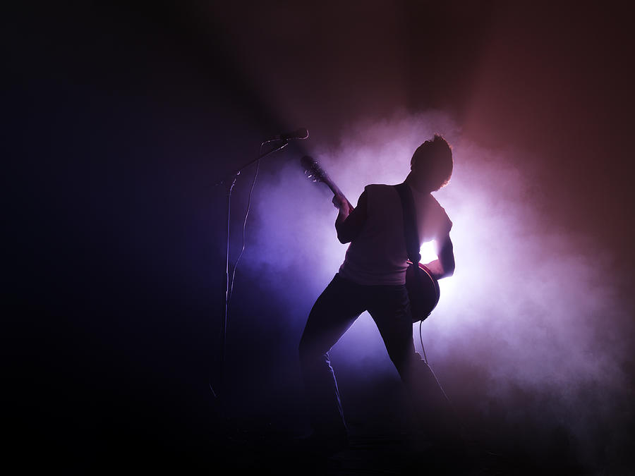 Guitarist performing on stage Photograph by Henrik Sorensen